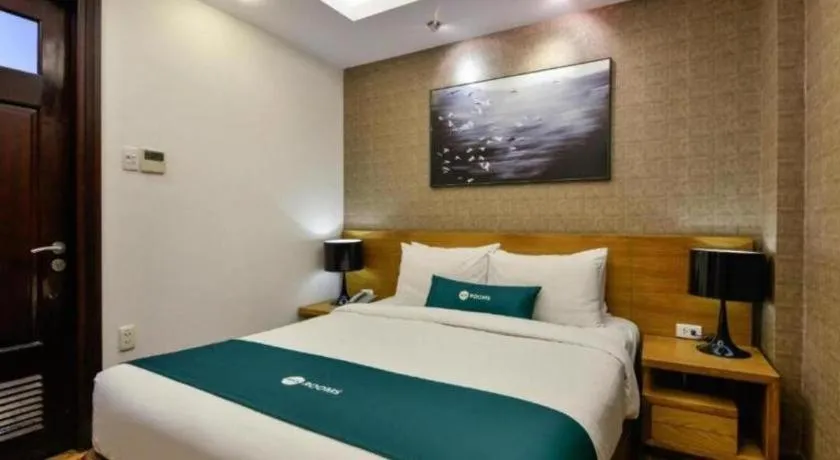 Bed in AHA Boutique Ben Thanh Hotel