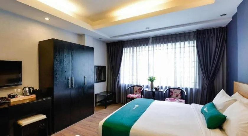 Bed in AHA Boutique Ben Thanh Hotel