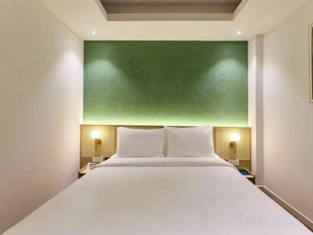 Bed in AHA Boutique Ben Thanh Hotel
