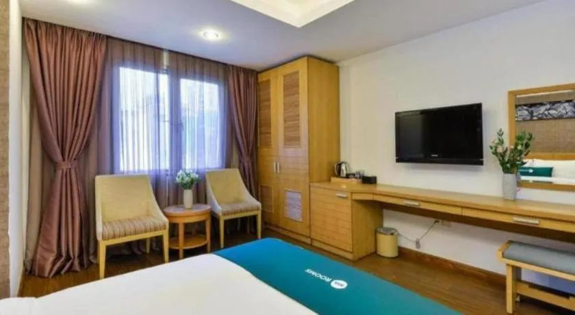 Bed in AHA Boutique Ben Thanh Hotel