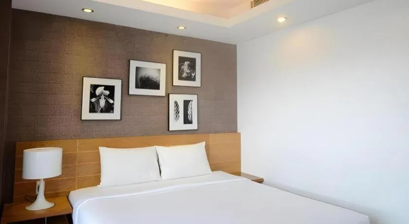 Bed in AHA Boutique Ben Thanh Hotel