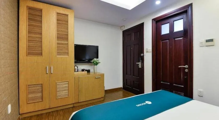 Bed in AHA Boutique Ben Thanh Hotel