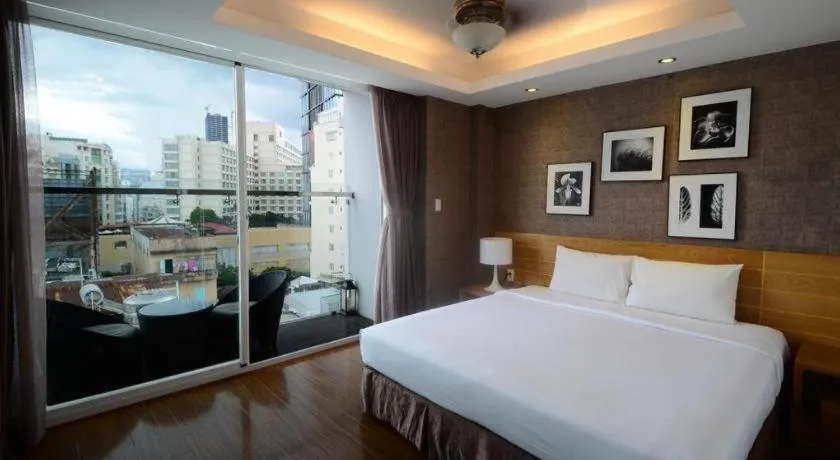 Bed in AHA Boutique Ben Thanh Hotel