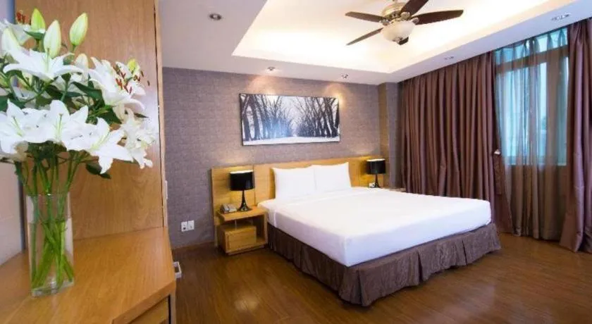 Bed in AHA Boutique Ben Thanh Hotel