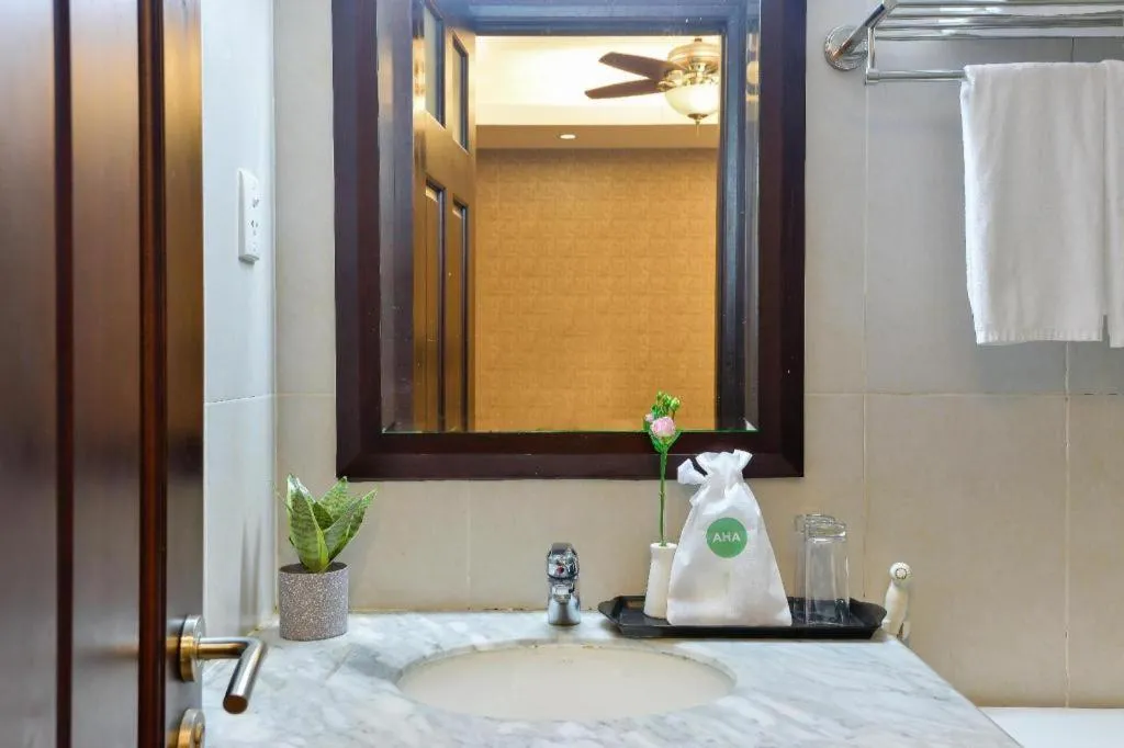 Bed in AHA Boutique Ben Thanh Hotel