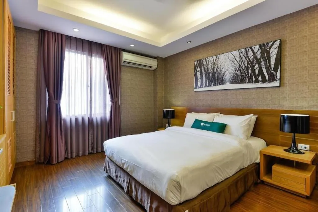 Bed in AHA Boutique Ben Thanh Hotel