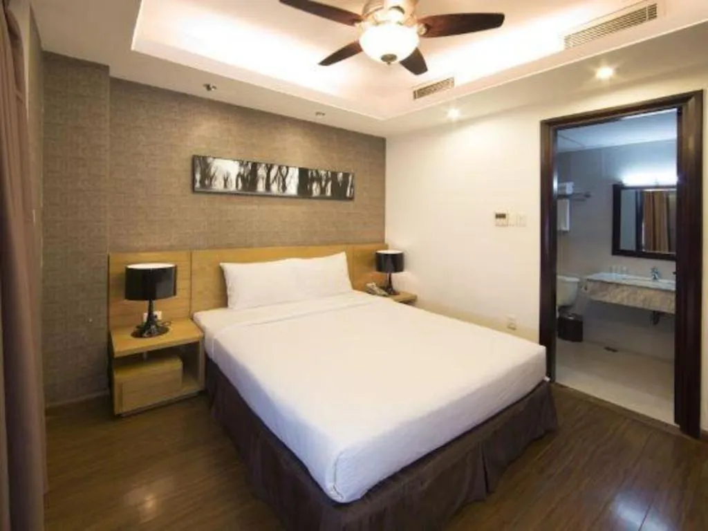 Bed in AHA Boutique Ben Thanh Hotel