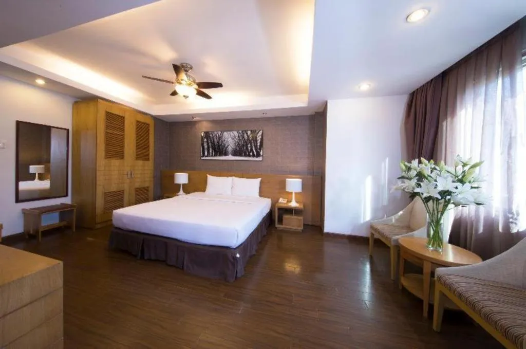 Bed in AHA Boutique Ben Thanh Hotel
