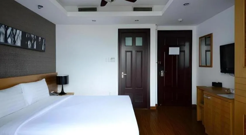 Bed in AHA Boutique Ben Thanh Hotel