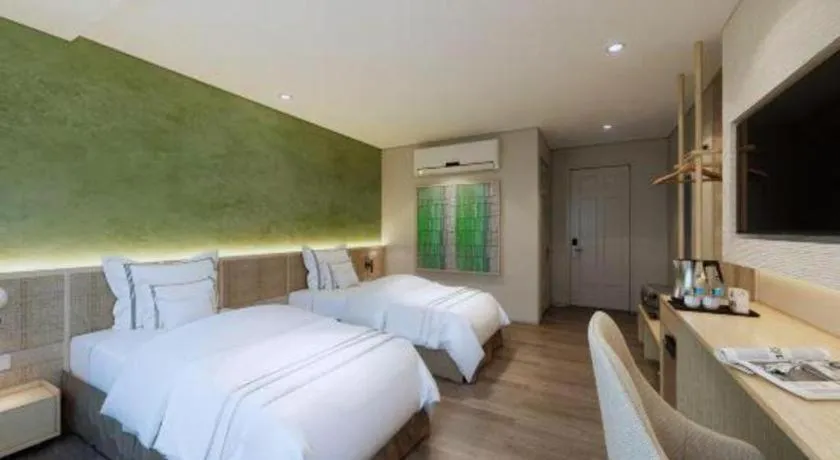 Bed in AHA Boutique Ben Thanh Hotel