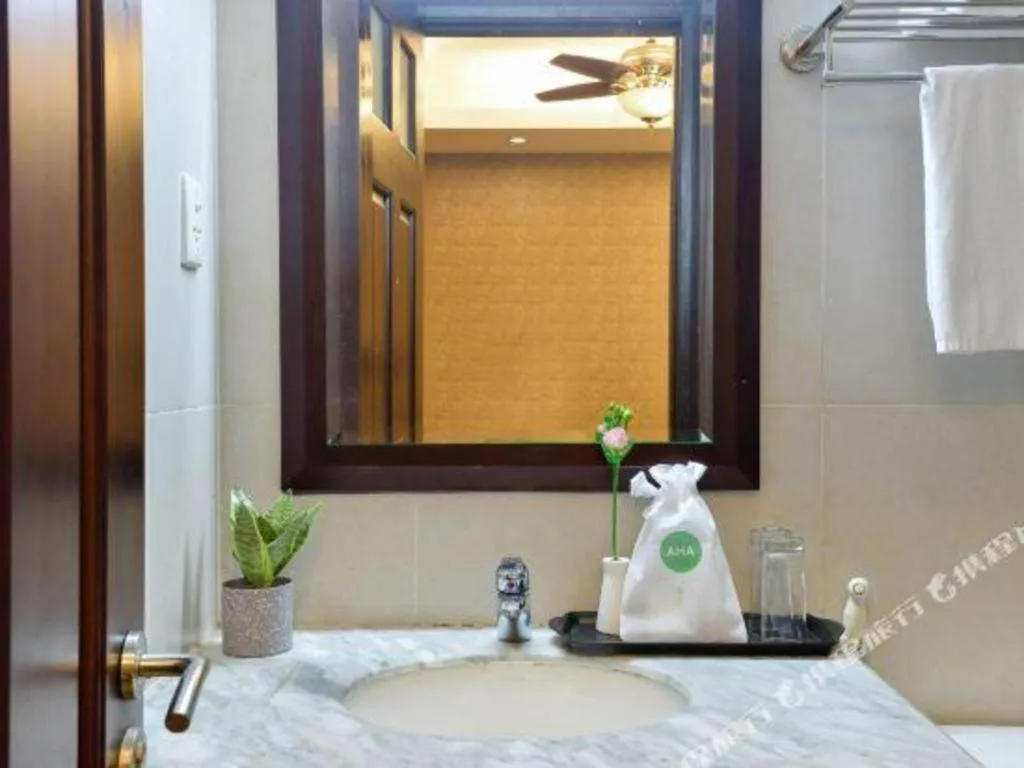 Bed in AHA Boutique Ben Thanh Hotel