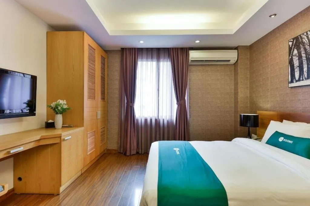 Bed in AHA Boutique Ben Thanh Hotel