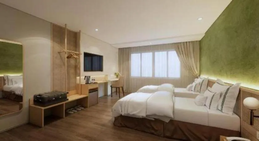 Bed in AHA Boutique Ben Thanh Hotel