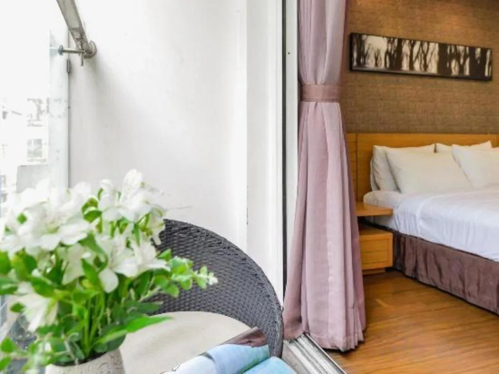 Bed in AHA Boutique Ben Thanh Hotel