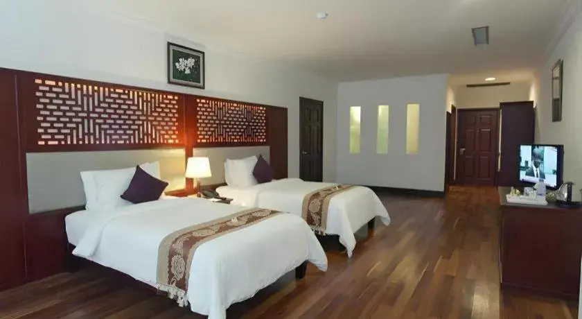 Bed in Sokhalay Angkor Residence and Spa Bed in Sokhalay Angkor Residence and Spa