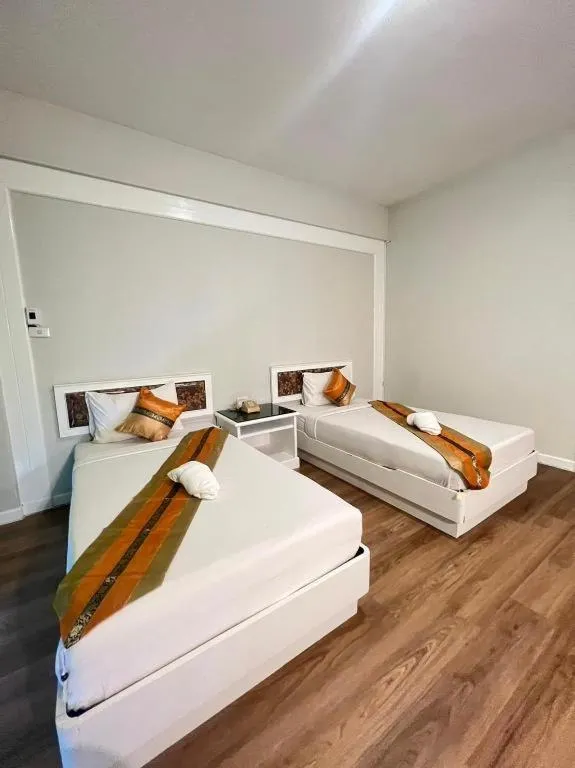 Bed in Chao Phya Grand Hotel