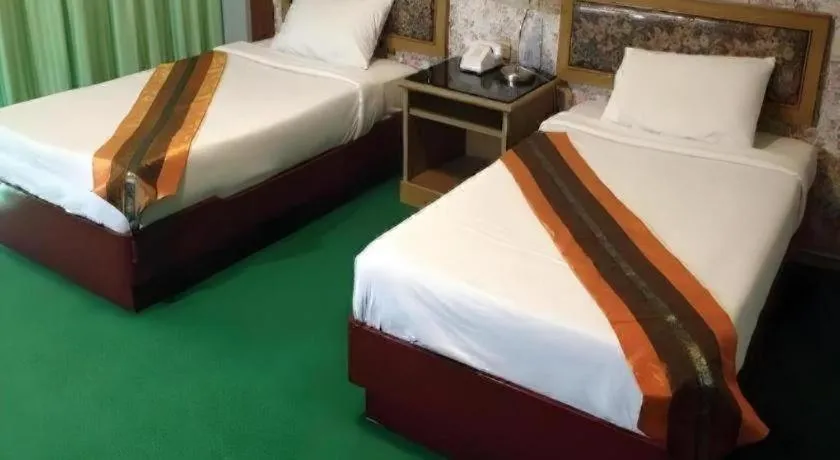 Bed in Chao Phya Grand Hotel