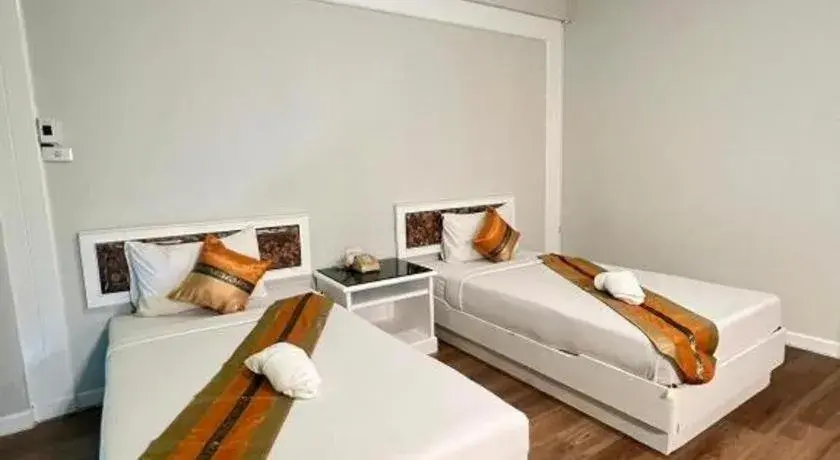 Bed in Chao Phya Grand Hotel Bed in Chao Phya Grand Hotel