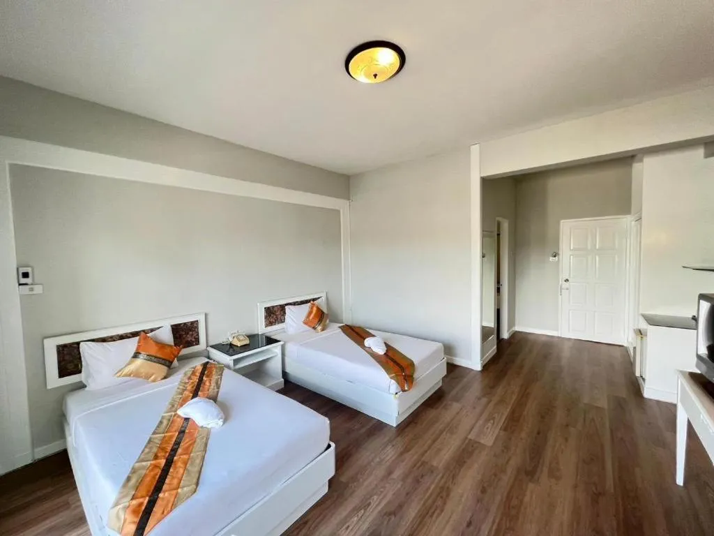 Bed in Chao Phya Grand Hotel