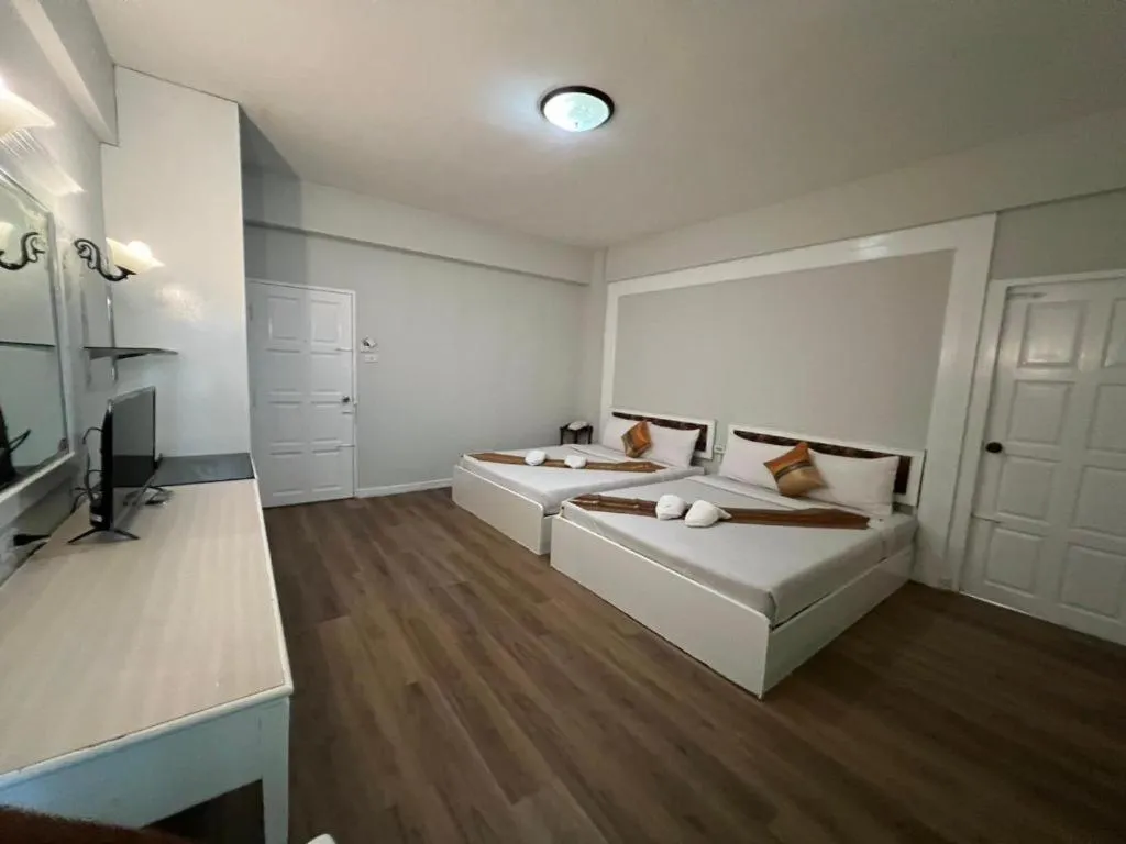 Bed in Chao Phya Grand Hotel