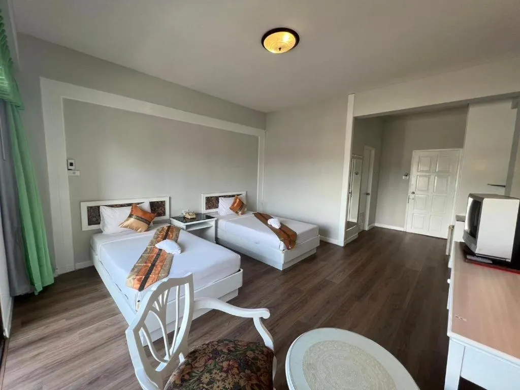 Bed in Chao Phya Grand Hotel