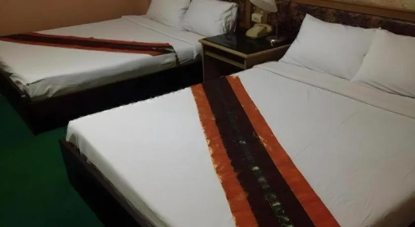 Bed in Chao Phya Grand Hotel