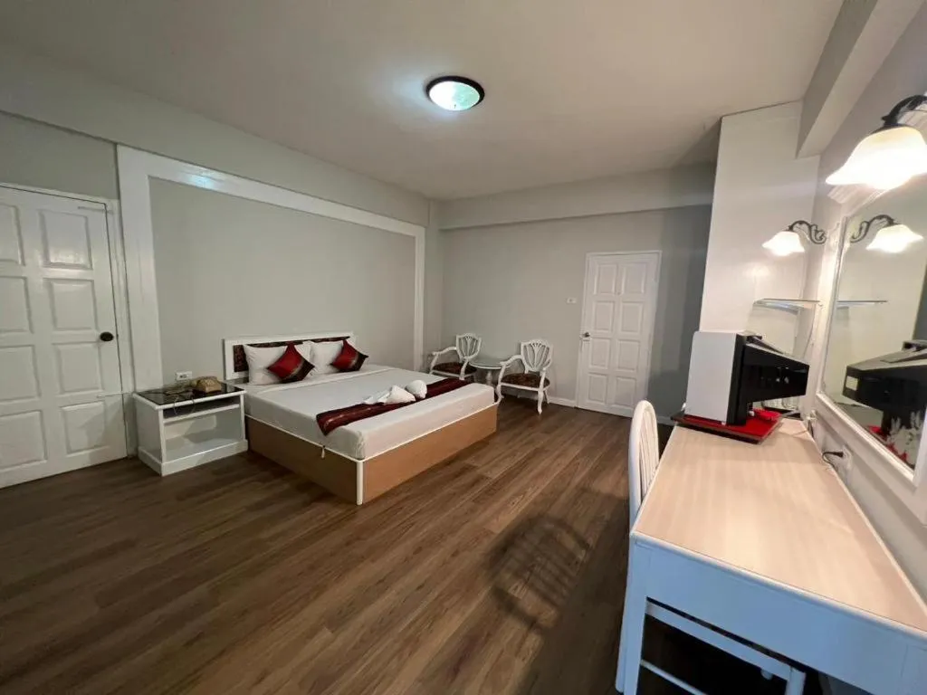 Bed in Chao Phya Grand Hotel