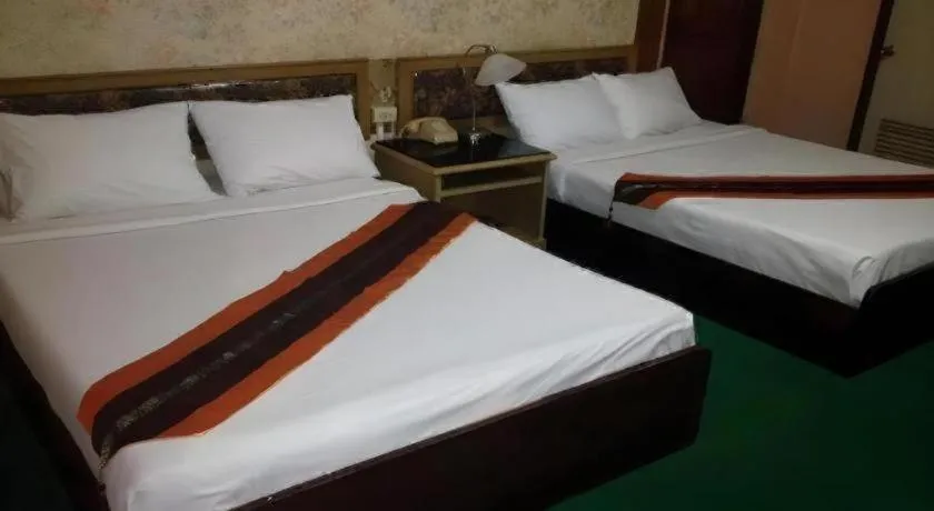 Bed in Chao Phya Grand Hotel