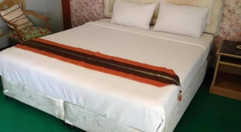Bed in Chao Phya Grand Hotel