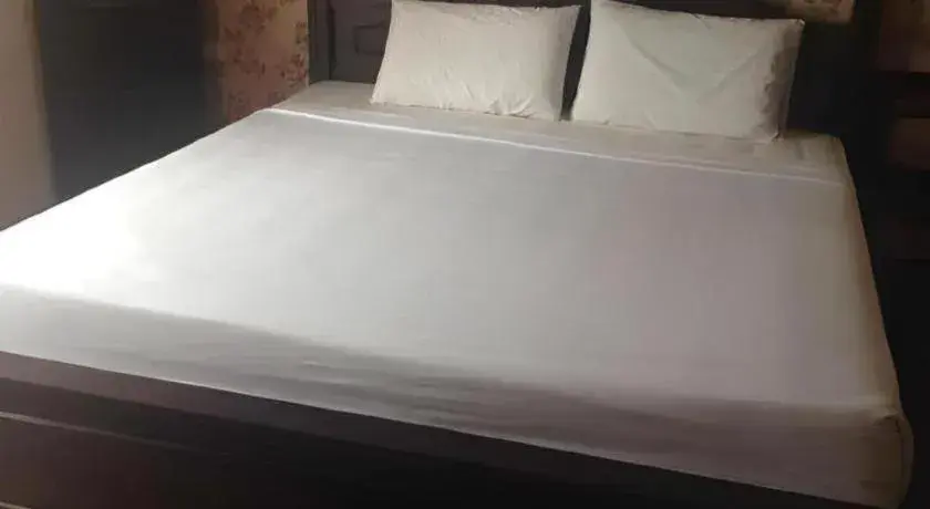 Bed in Chao Phya Grand Hotel Bed in Chao Phya Grand Hotel