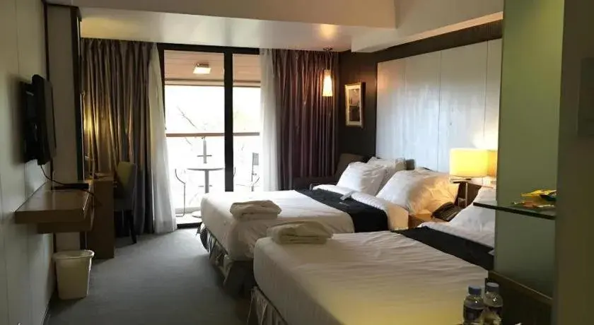 Bed in Le Monet Hotel Bed in Le Monet Hotel