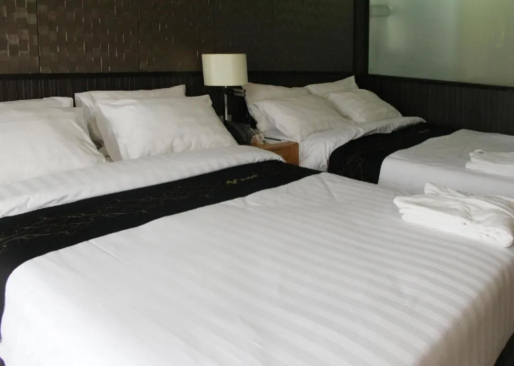 Bed in Le Monet Hotel