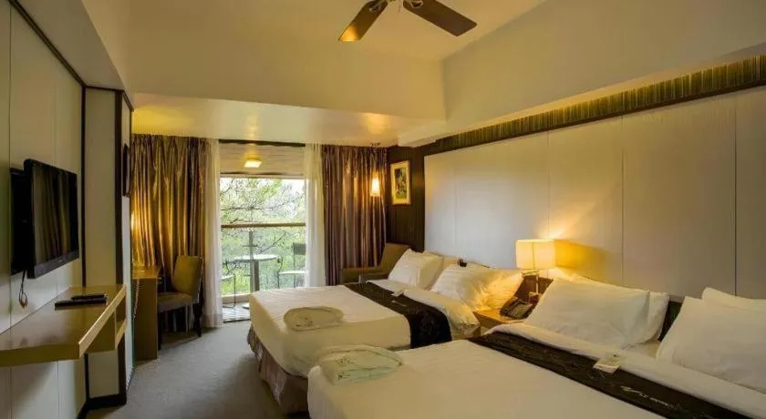 Bed in Le Monet Hotel