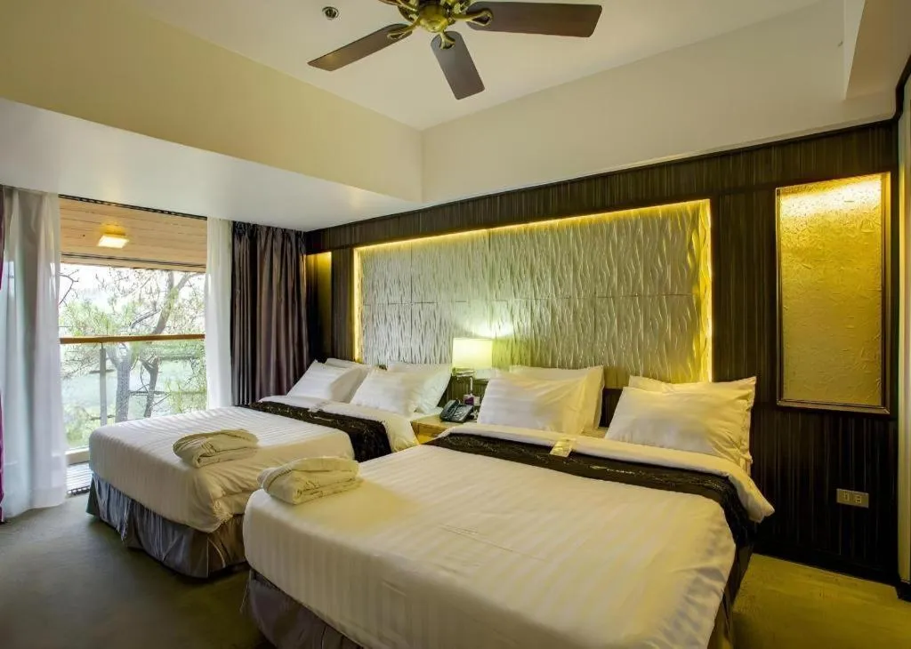 Bed in Le Monet Hotel