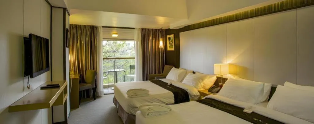 Bed in Le Monet Hotel