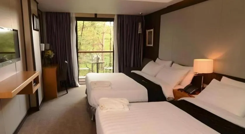 Bed in Le Monet Hotel