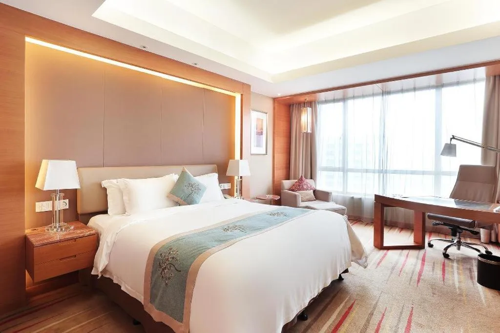 Bed in Howard Johnson by Wyndham Sunshine Plaza Ningbo