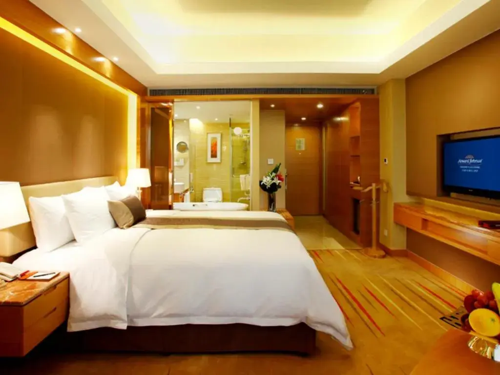 Bed in Howard Johnson by Wyndham Sunshine Plaza Ningbo Bed in Howard Johnson by Wyndham Sunshine Plaza Ningbo