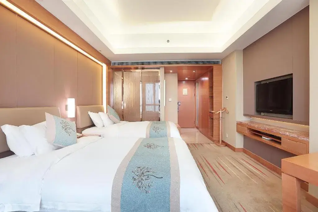 Bed in Howard Johnson by Wyndham Sunshine Plaza Ningbo Bed in Howard Johnson by Wyndham Sunshine Plaza Ningbo