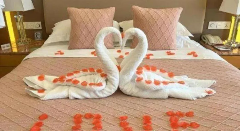 Bed in Howard Johnson by Wyndham Sunshine Plaza Ningbo