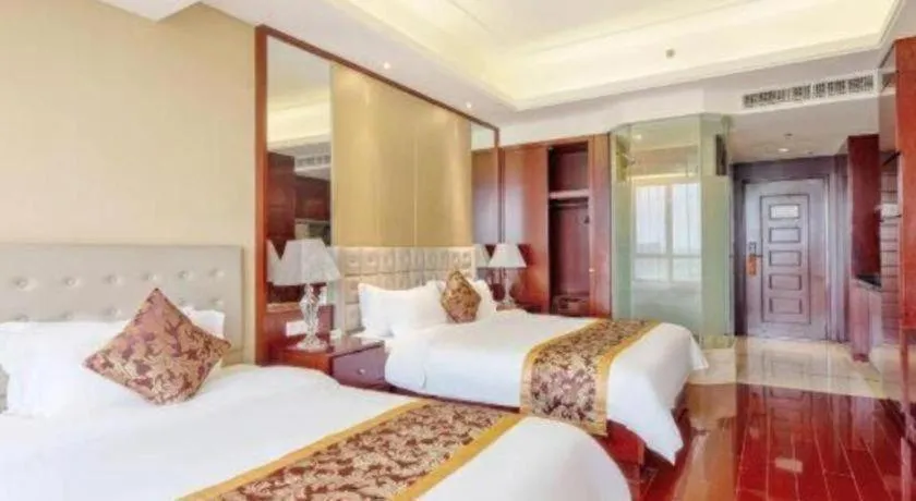 Bed in Howard Johnson by Wyndham Sunshine Plaza Ningbo