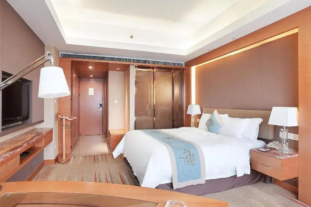 Bed in Howard Johnson by Wyndham Sunshine Plaza Ningbo Bed in Howard Johnson by Wyndham Sunshine Plaza Ningbo