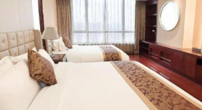 Bed in Howard Johnson by Wyndham Sunshine Plaza Ningbo