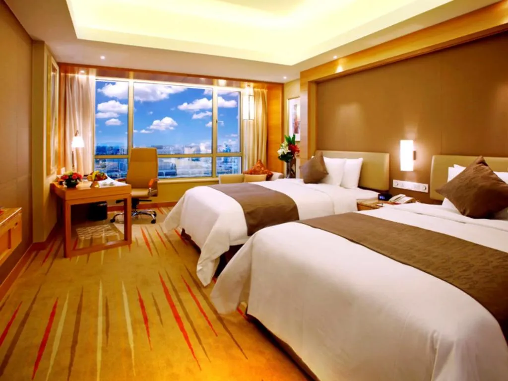 Bed in Howard Johnson by Wyndham Sunshine Plaza Ningbo