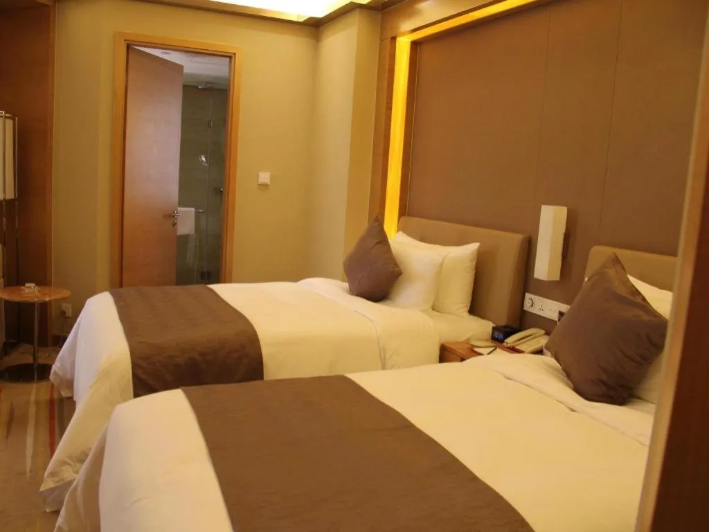 Bed in Howard Johnson by Wyndham Sunshine Plaza Ningbo