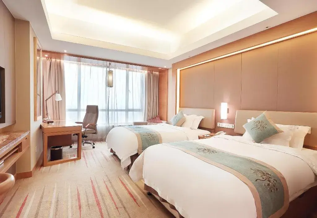 Bed in Howard Johnson by Wyndham Sunshine Plaza Ningbo Bed in Howard Johnson by Wyndham Sunshine Plaza Ningbo
