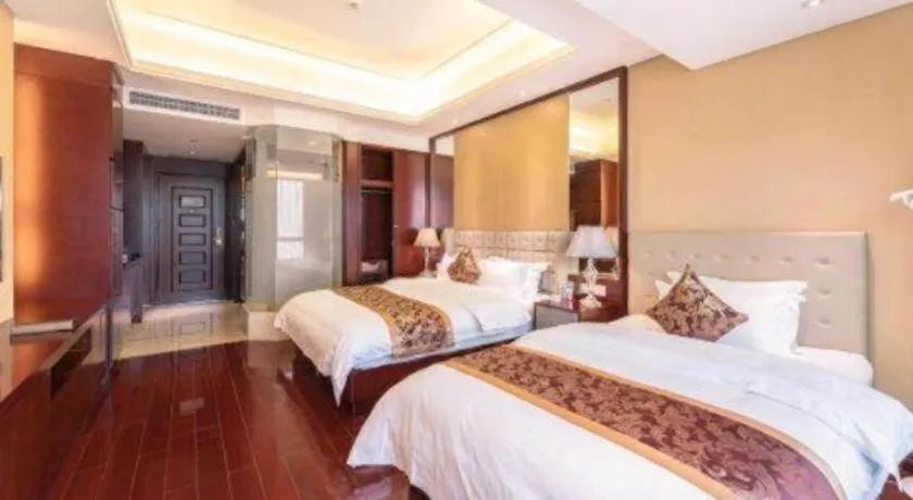 Bed in Howard Johnson by Wyndham Sunshine Plaza Ningbo