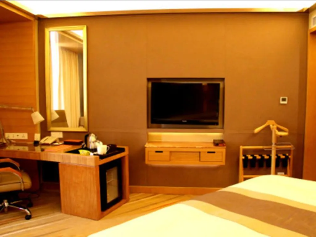 Bed in Howard Johnson by Wyndham Sunshine Plaza Ningbo