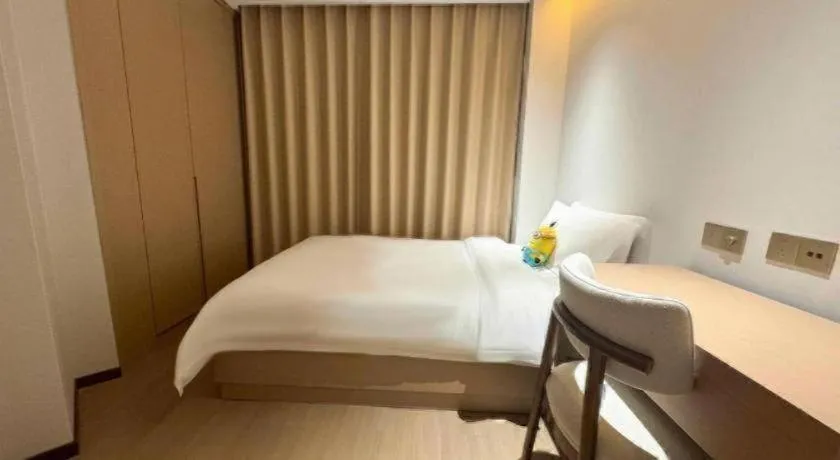 Bed in Howard Johnson by Wyndham Sunshine Plaza Ningbo