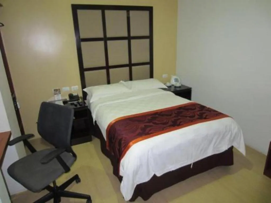 Bed in Avenue Suites